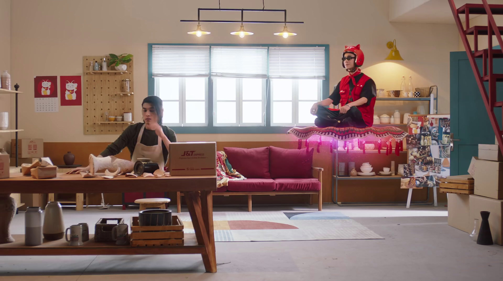 a man and a woman sitting on a couch in a living room