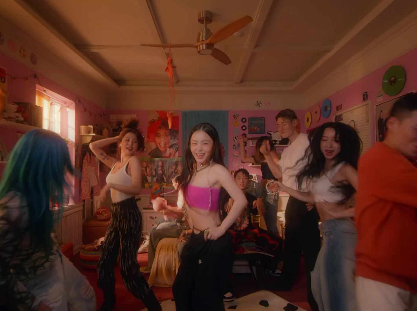 a group of people dancing in a room