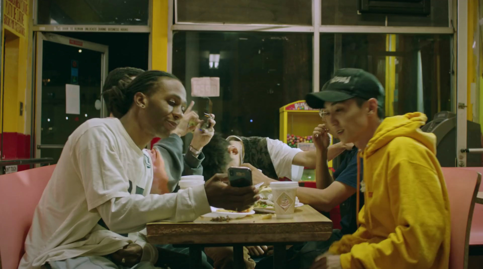 a group of people sitting around a table