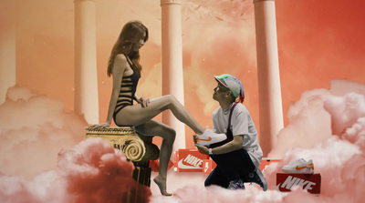 a woman sitting on a man's lap in the clouds