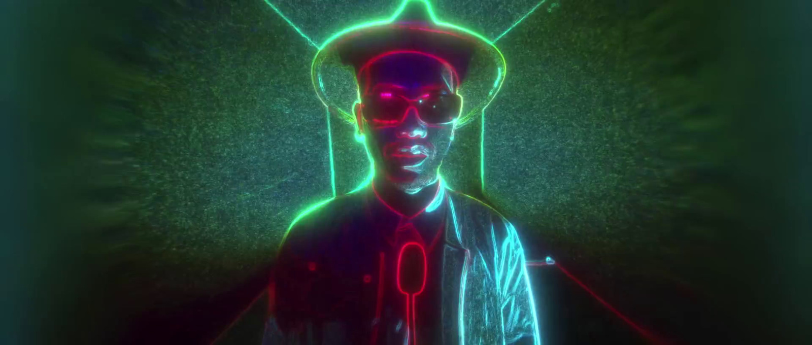 a man in a neon light suit and hat