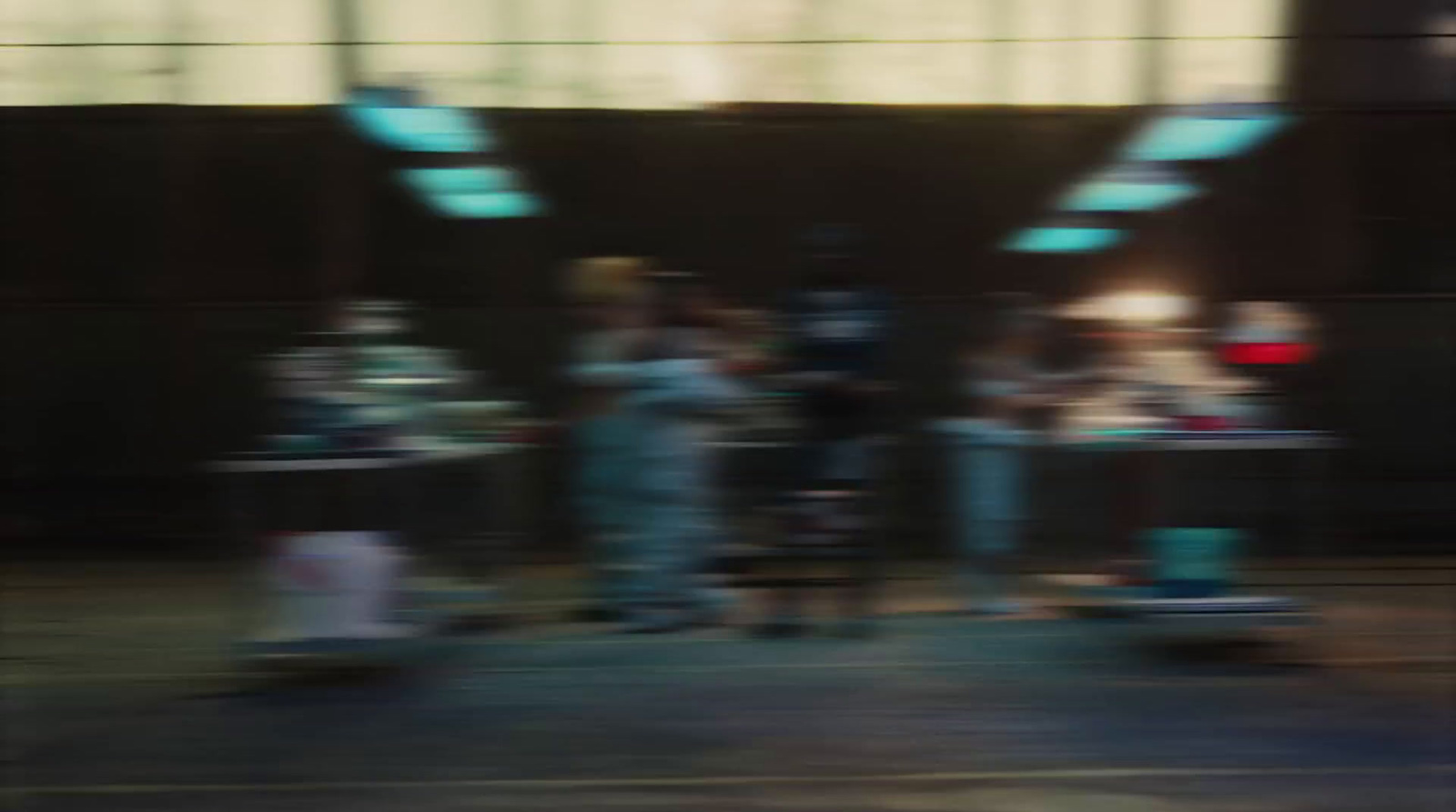 a blurry photo of a person on a skateboard