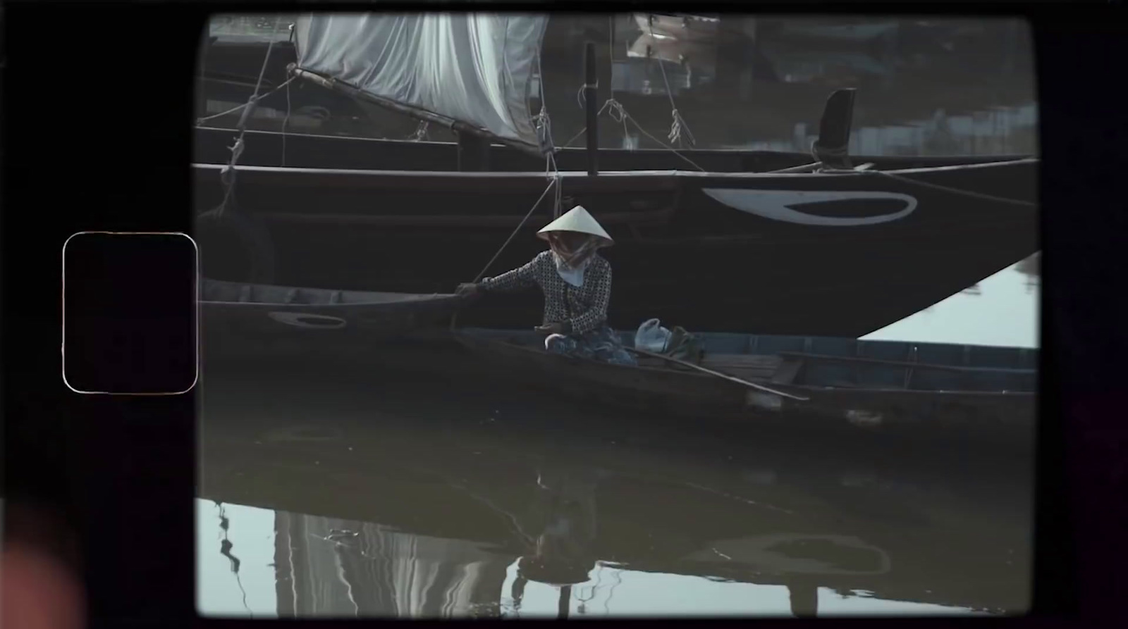 a person sitting in a boat in the water