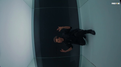 a man standing in front of a black surfboard