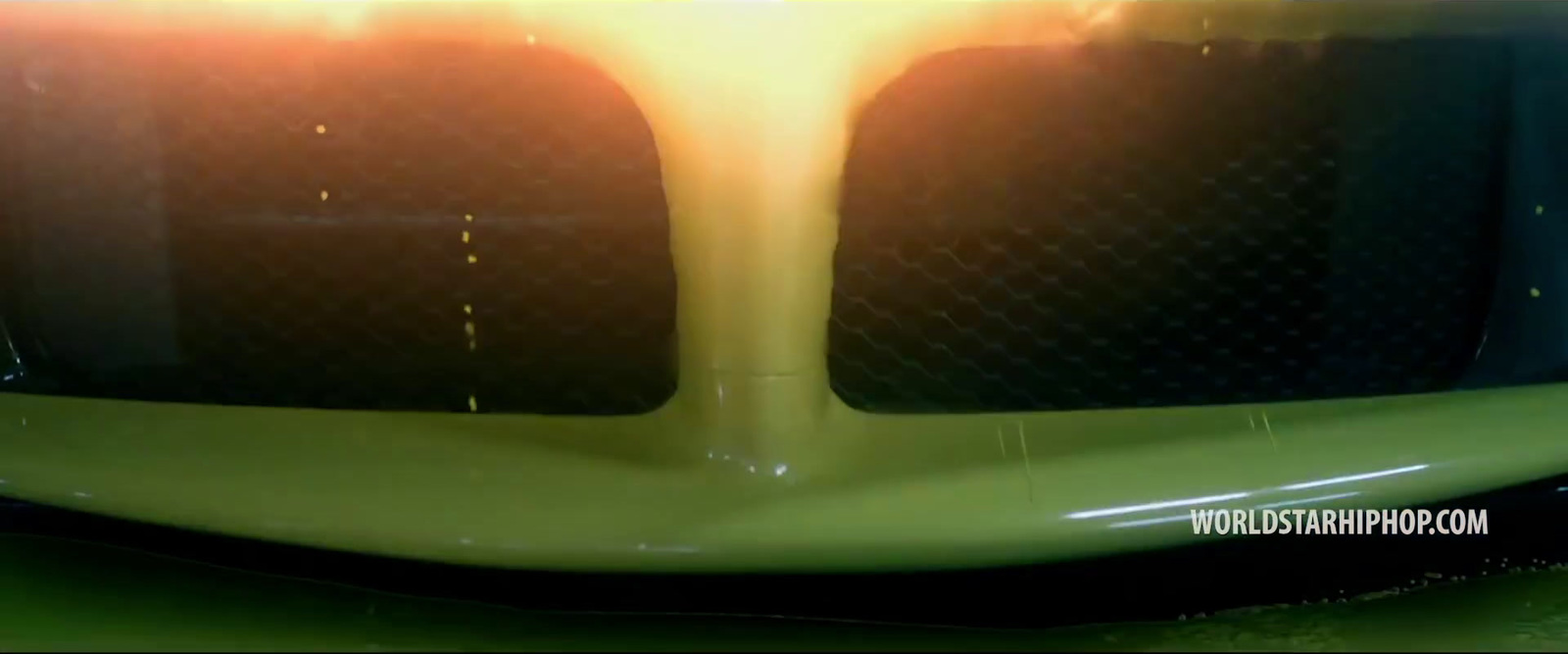 a close up of the hood of a sports car