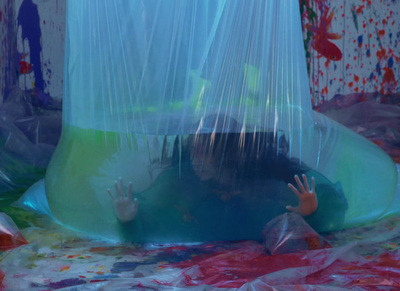 a person in a plastic bag in a room