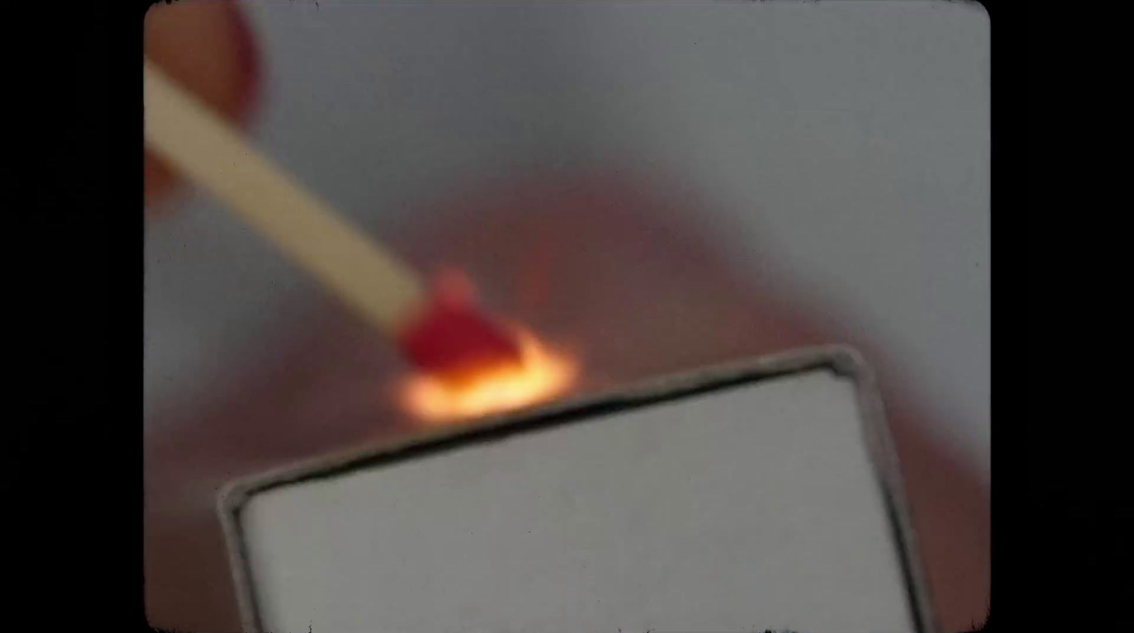 a match being lit by a match stick