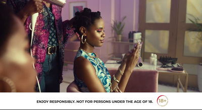 a woman is getting her hair done in a salon