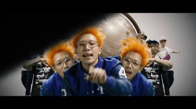 a group of people with orange hair on their heads