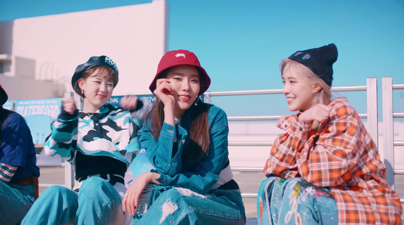 a group of young women sitting next to each other