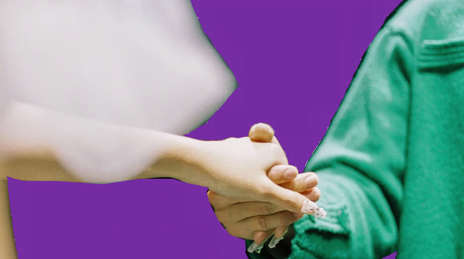 a man and a woman holding hands over a purple background