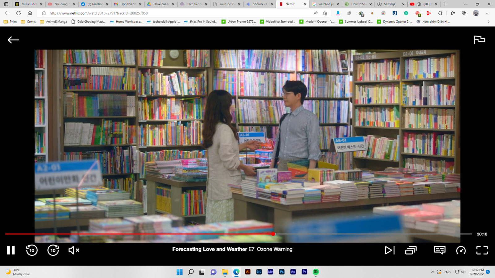 a man and a woman standing in front of a book store