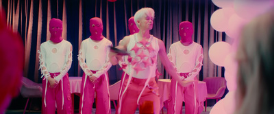 a group of mannequins in pink and white outfits