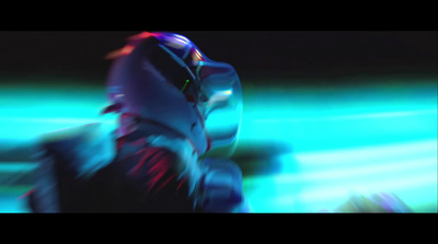 a blurry image of a person in a helmet