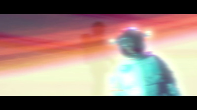 a blurry image of a person in a space suit