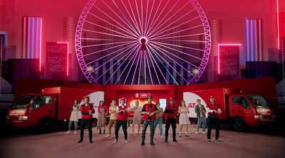 a group of people standing in front of a ferris wheel