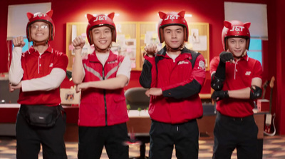 a group of young men wearing red uniforms