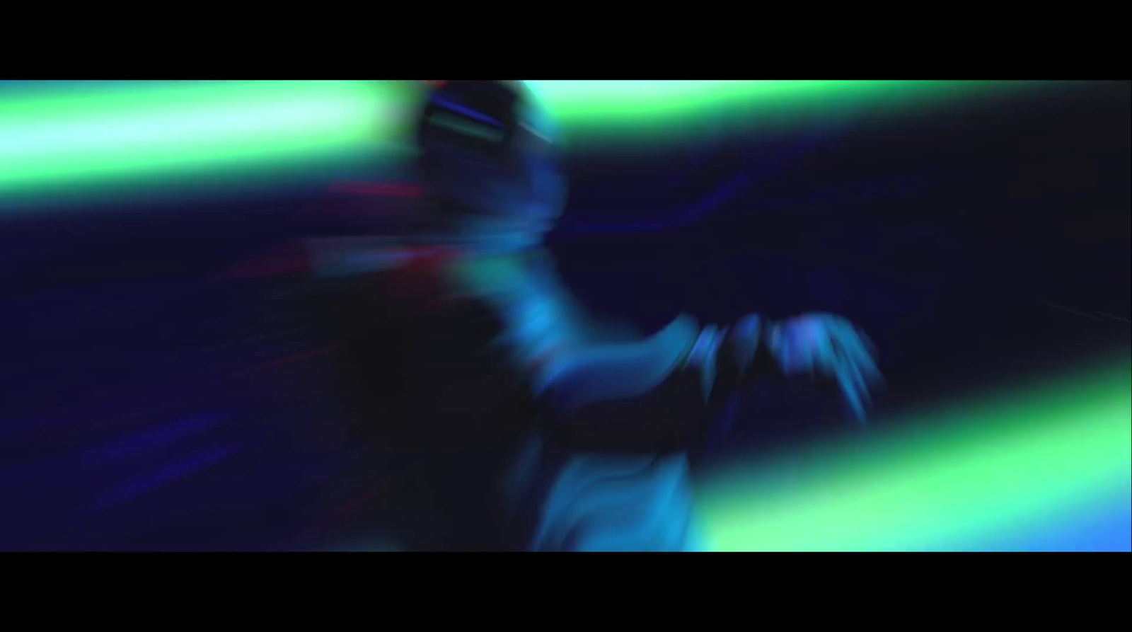 a blurry image of a person dancing in the dark