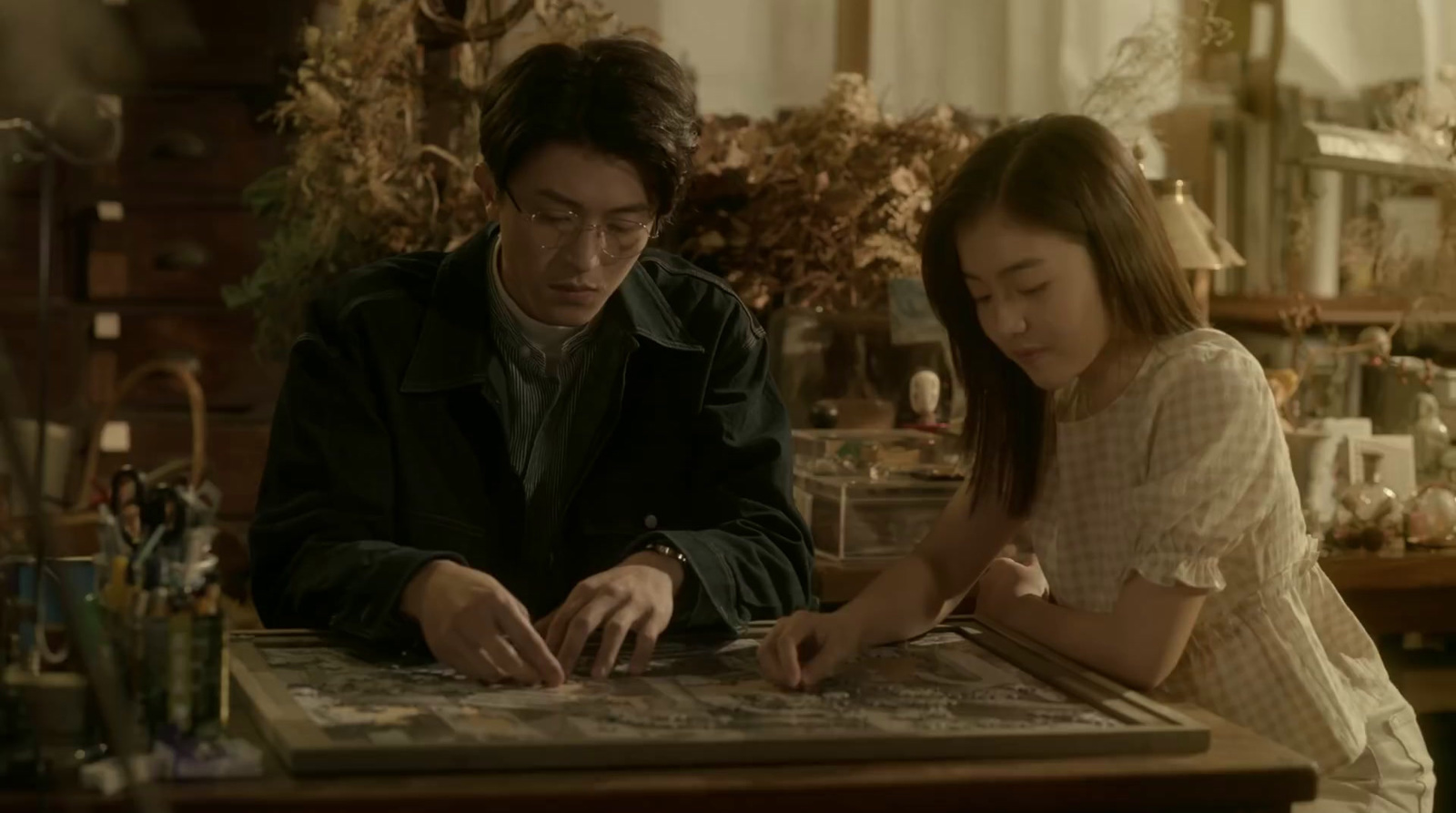 a man and a woman sitting at a table