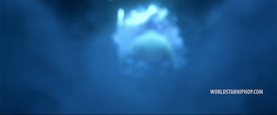 a blurry image of a person floating in the water