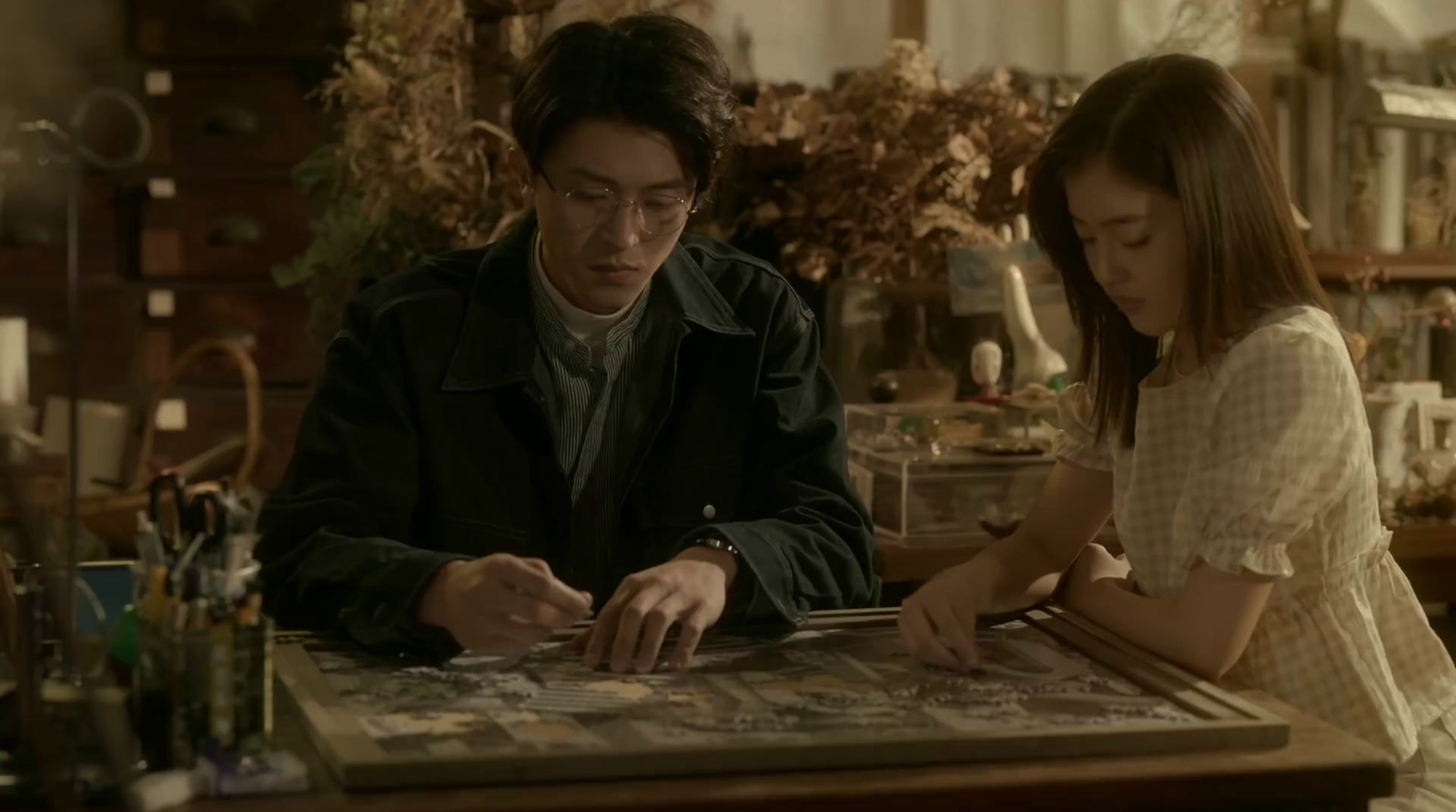 a man and a woman sitting at a table