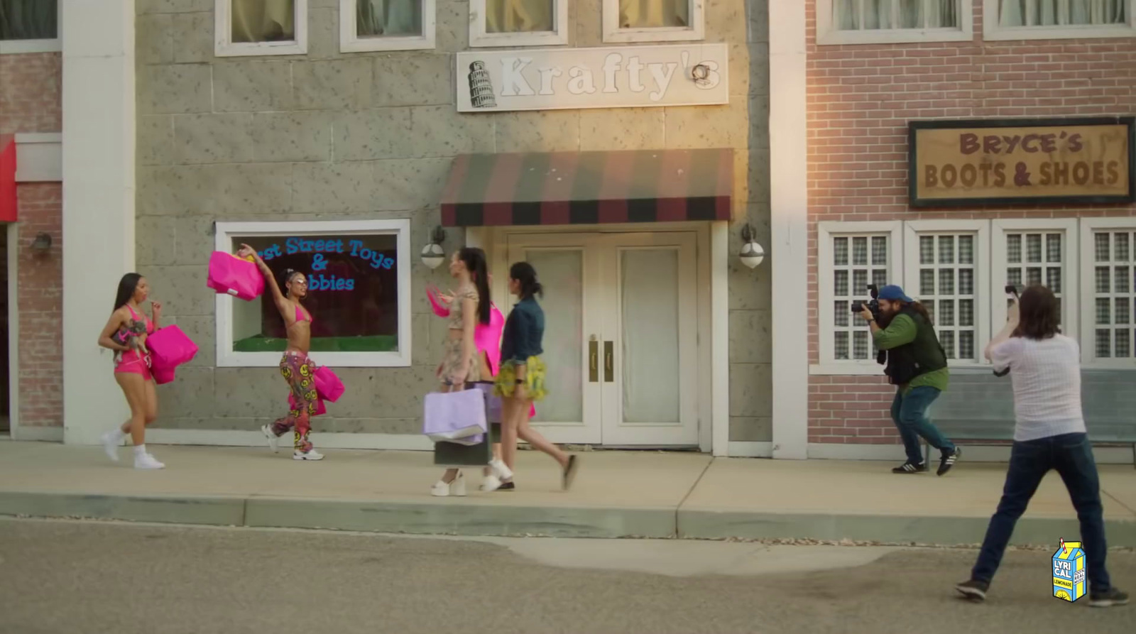 a group of women walking down a street