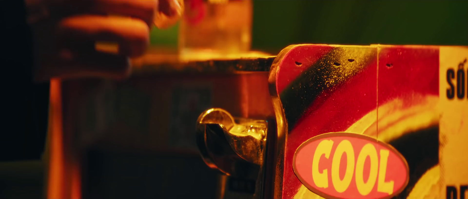 a close up of a soda dispenser with a sticker on it