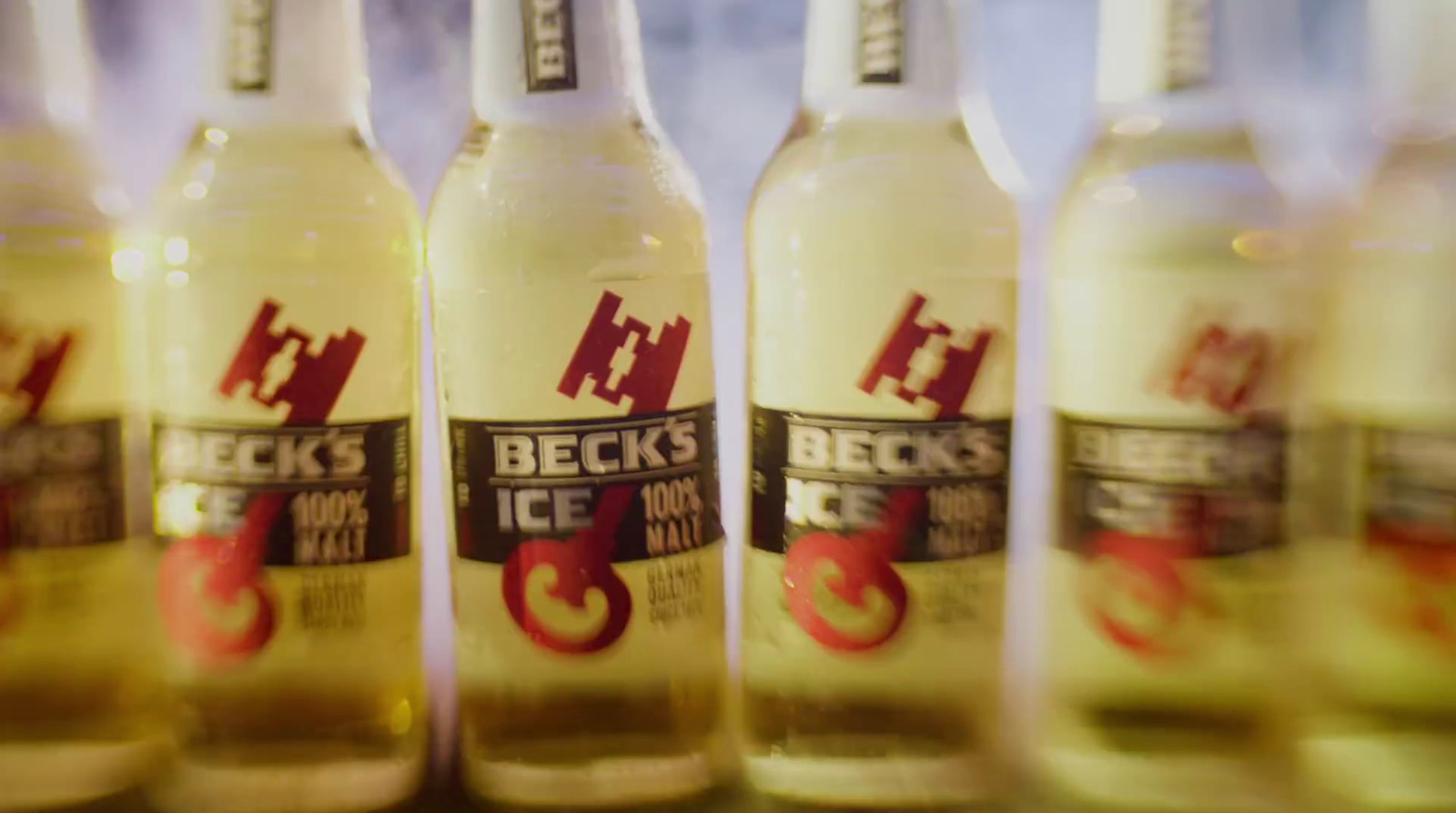 a close up of several bottles of beer