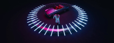 a car is parked in a circle of neon lights