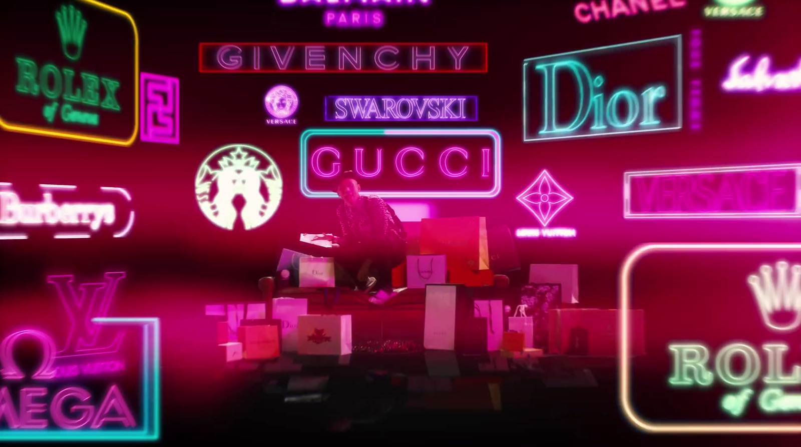 a wall with many neon signs and symbols on it