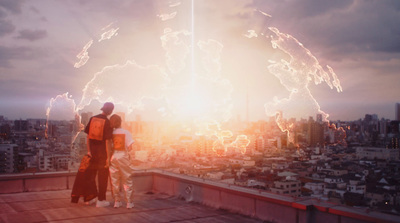 a couple of people standing on top of a building