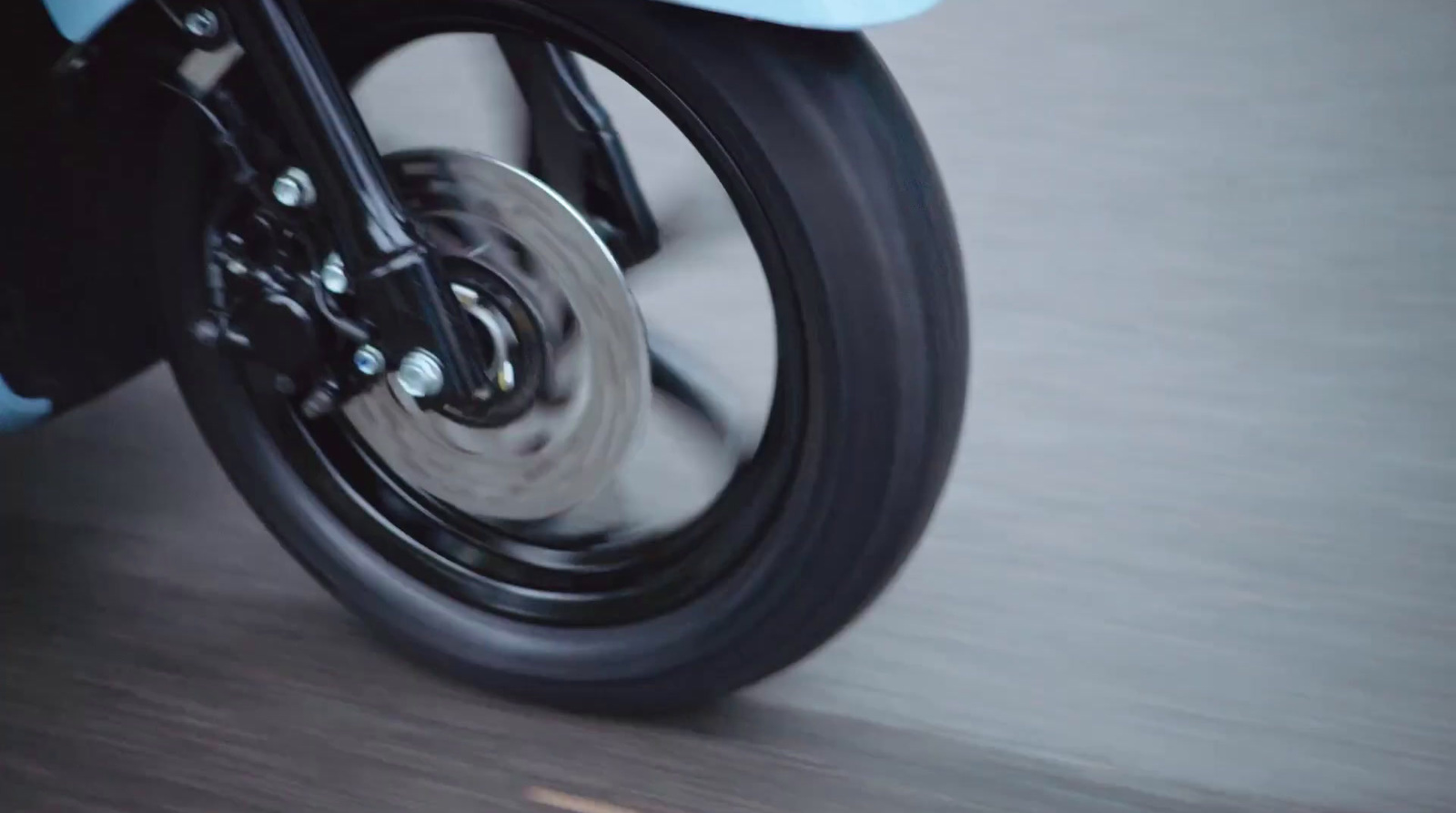 a close up of a motorcycle tire on a road