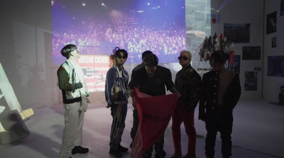 a group of young men standing next to each other