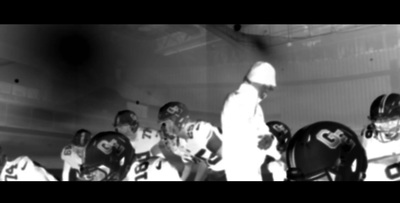 a black and white photo of a football team