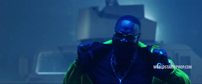 a man wearing a neon green jacket and a black mask