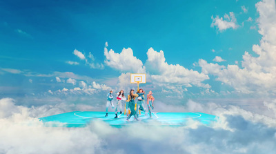 a group of people standing on top of a basketball court