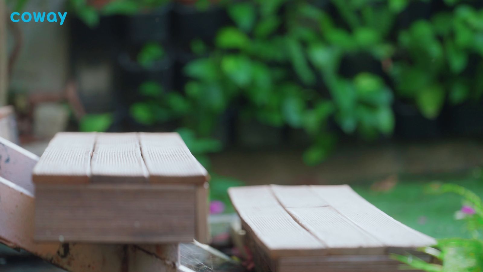 a close up of a bench made out of wood