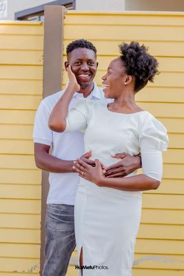 a man and a woman standing next to each other