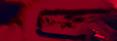 a blurry image of a red and black object