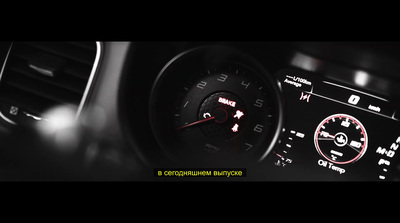 a close up of a car dashboard with a speedometer