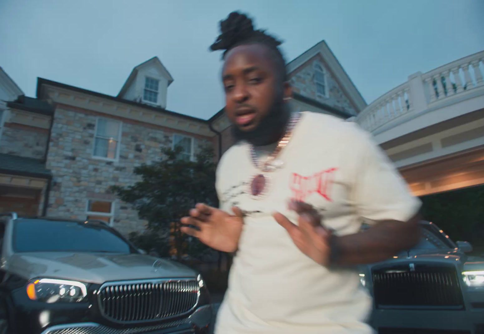 a man standing in front of a car