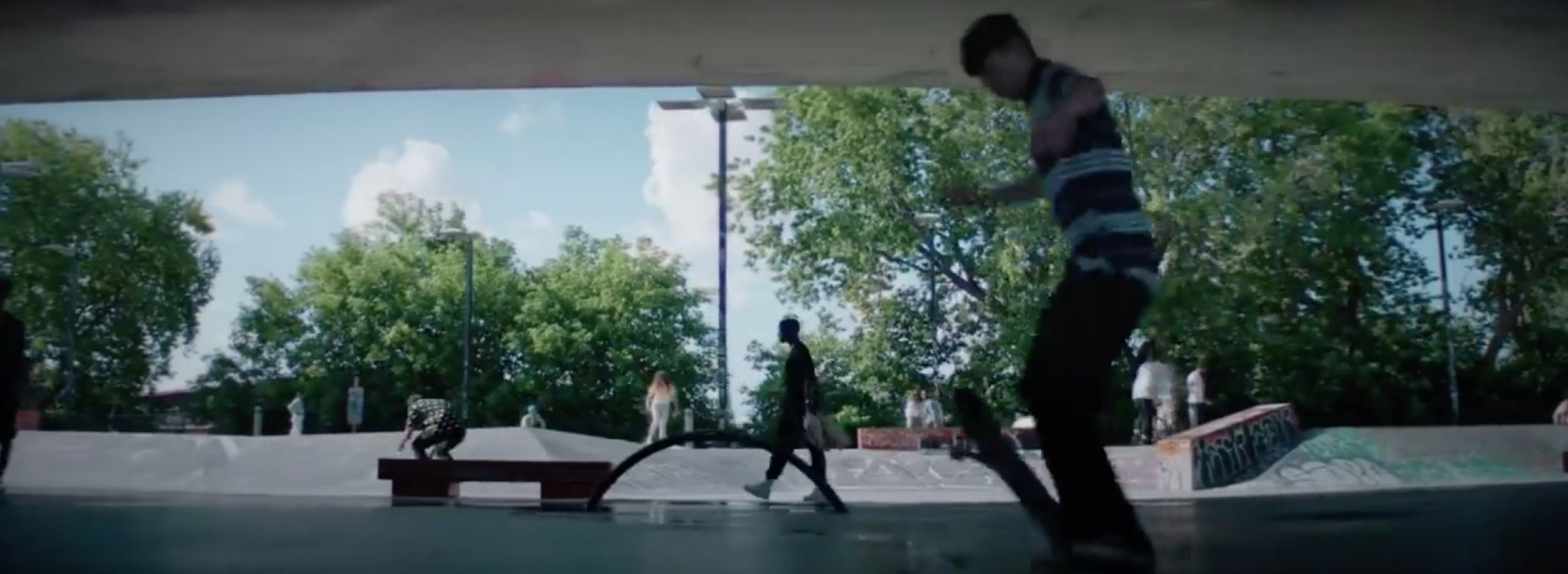 a person riding a skateboard in a skate park