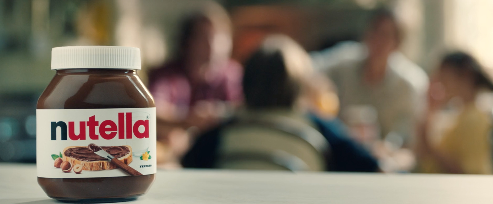 a bottle of nutella sitting on top of a table