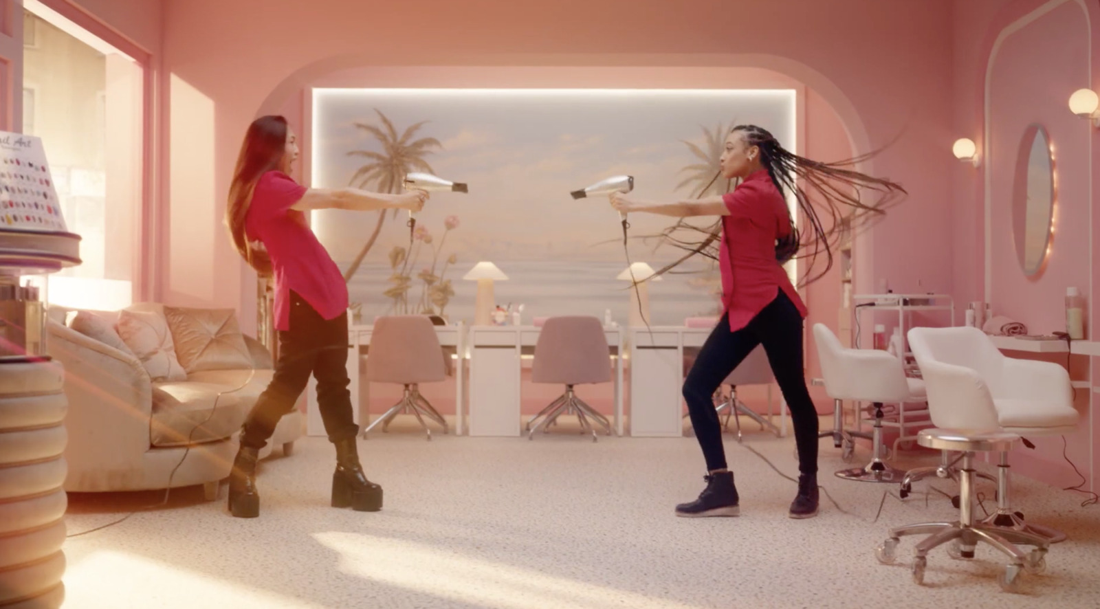 a couple of women standing in a room