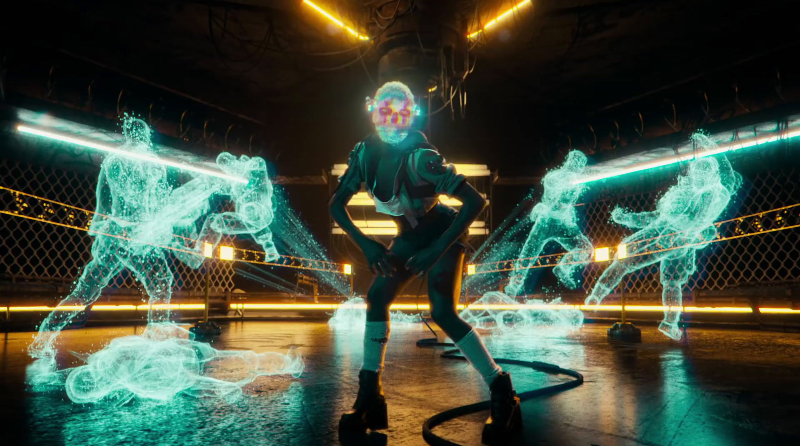 a man in a futuristic suit standing in front of neon lights