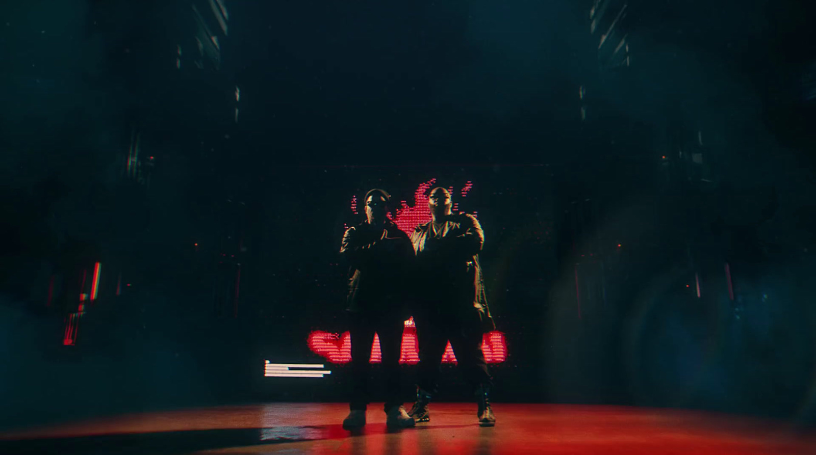 a group of people standing on top of a stage