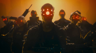 a group of people with red lights on their faces