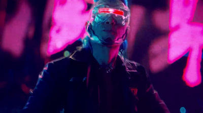 a man wearing a mask and glasses in front of a neon background