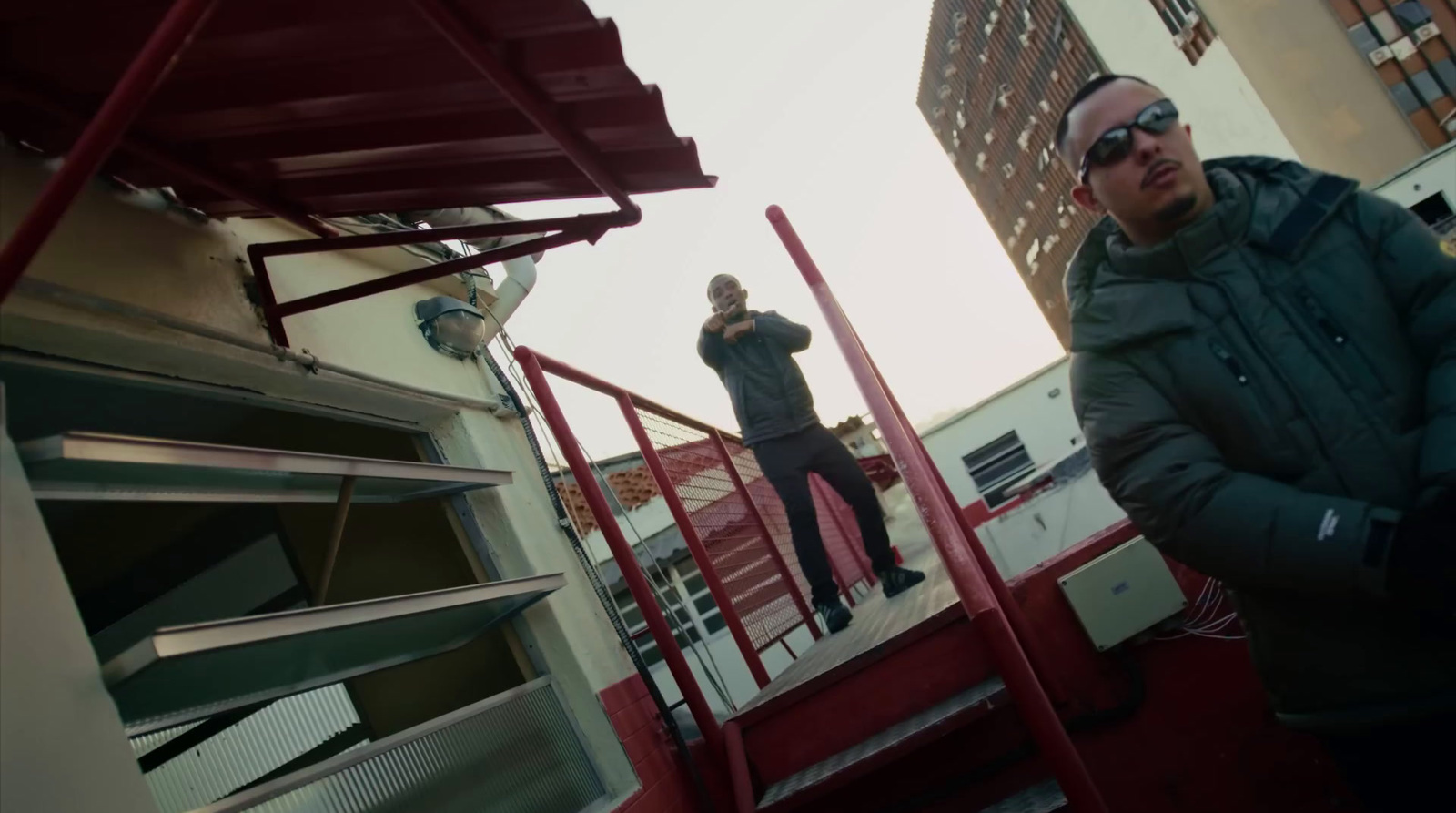 a man standing on top of a set of stairs