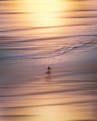 a person on a surfboard in the water